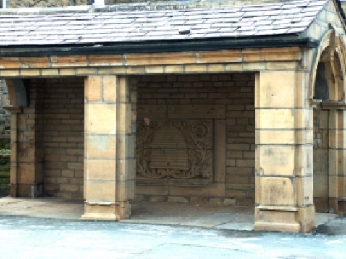 Photo of the Beehive stone shelter at junction of Royd Street and Main Street.