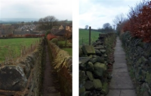 A photo of a stone walled footpath.