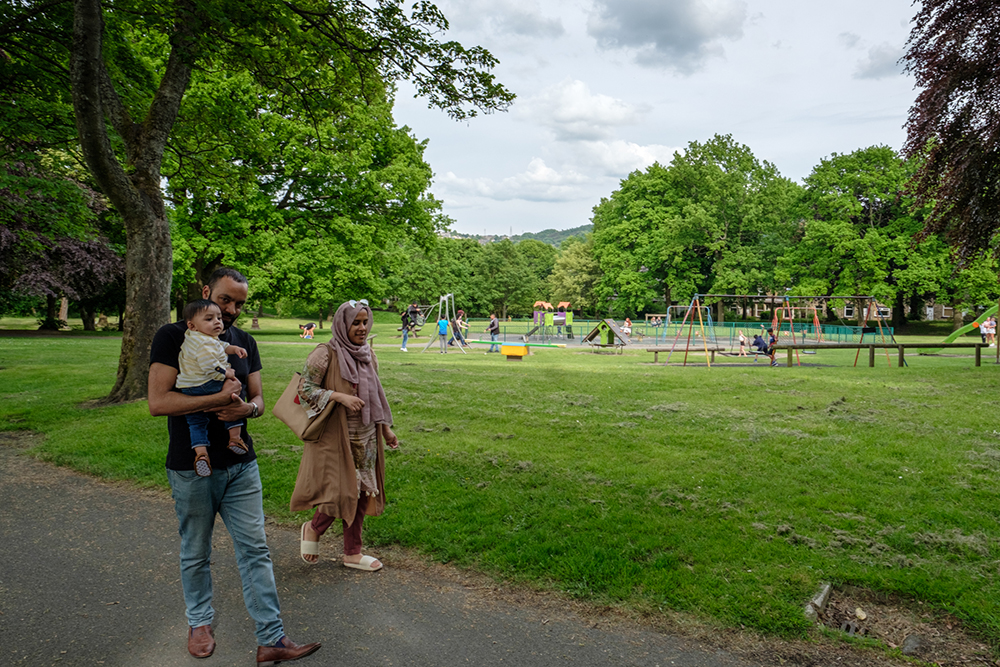 Family having a walk in Lund Park.