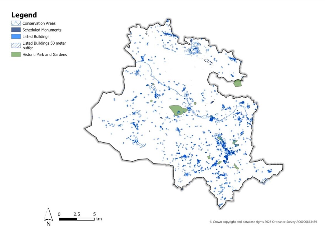 Map identifying heritage assets and areas of historic significance across the District, including conservation areas, listed buildings, scheduled monuments, historic parks and gardens, and other designated heritage sites.